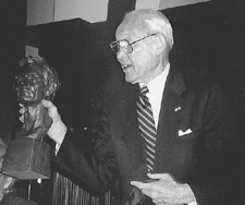 McNeil receives a bronze bust of Abraham Lincoln