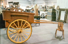 A governessor pony cart displayed at SmithZukas Wells Me