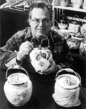 Dan Weber of Antiques by Joyce Pittsburgh Pa with a selection of rare biscuit jars New England Motel