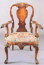 Sold by London dealers ApterFredericks at Grosvenor House was this extremely rare George I burr walnut armchair with outscrolled arms terminating in eagles heads circa 1720