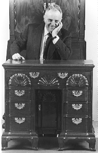 Harold Sack photographed with his blockbuster blockandshell kneehole desk Photo courtesy of The New York Times