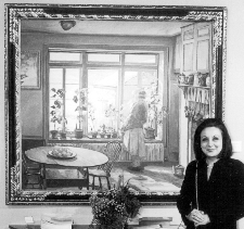 Linda Tomkins in front of Edward Redfields The South Window in the booth of Hollis Taggart New York City