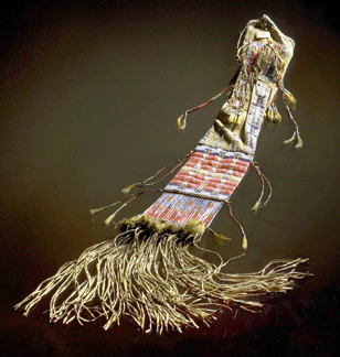 This Lakota beaded and quilled hide tobacco bag sold for $101,200.