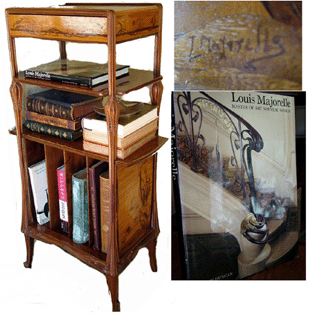 The sinuous form of the signed Louis Marjorelle music stand with satinwood inlay attracted $6,043.
