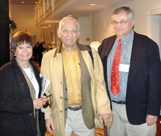 Norm Flayderman and his wife, Judy, journeyed up from Florida to attend the sale, here being welcomed by Ron Bourgeault.