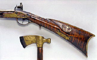 An American full-stocked flintlock buck and ball gun and tomahawk, attributed to John Young, fourth quarter of the Eighteenth Century, very good condition, went for $102,667, against a high estimate of $60,000. It has a 34 7/8 -inch octagonal barrel in .53 caliber smoothbore and the lock is signed Ketland/&/Adams.