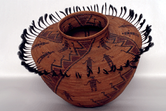 This Yokuts bottleneck basket with three-color human designs and quail top knots was discovered in the basement of a Great Falls, Mont., home in March 2006. It sold for $34,500.