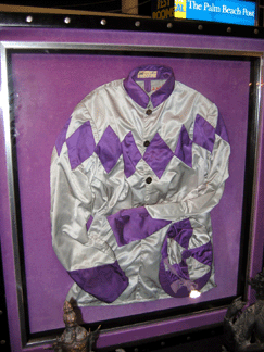 Local Florida dealers Rosemary and Jim Holmes displayed a framed set of jockey silks for $575, a memento of the state's horse-racing history.