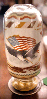 The Andrew Clemmens sand bottle with patriotic decoration sold for $3,900.