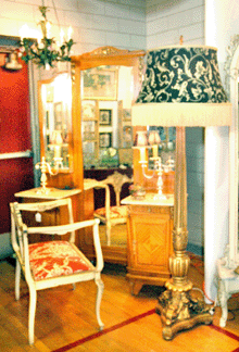 The mahogany and satinwood French vanity with bronze ormolu trim, circa 1910, was among Saturday morning sales at Yesterday's Luxuries, Hamden, Conn.