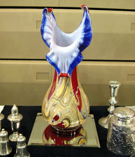 Among the 1950s glass, tools and jewelry offered by Jantiques of Belchertown, Mass., was a Russian glass vase identified as having been made by  Baijas.