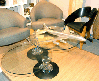 This fantastic Italian glass swivel table made by Naos, the so-called "La Casa Animati,†was made in the late 1980s and was shown by Ed and Betty Koren of Bridges Over Time, Newburgh, N.Y.