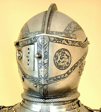 This Sixteenth Century Prussian suit of armor has been found to have been made for Joachim II Hektor by master armorer Peter von Speyer. The helmet (detail shown) features intricate carving.