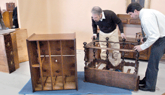 Furniture included a Massachusetts William and Mary burl walnut veneered highboy that had seemingly spent as much time being dissected and thoroughly inspected during preview as it did whole. It sold to a buyer standing in the rear of the auction hall for $44,080.