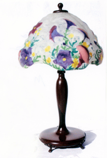 A signed Pairpoint purple pansy puffy lamp sold for $4,700.