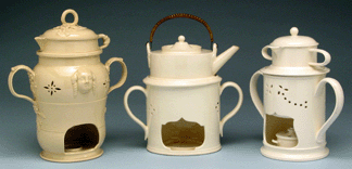 The name "veilleuse†derives from the French veiller, meaning to keep a night vigil. It originally referred to any night lamp but soon came to be applied to a warmer for food or drink. The example on the far right retains all of its parts, including its spirit burner. Staffordshire or Yorkshire, England, circa 1780‱820. Historic Deerfield, museum purchase with funds provided by Ray J. and Anne K. Groves. 
