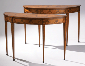 A pair of English George III satinwood console tables ($30/40,000) in the manner of Mayhew & Ince, 31¾ by 48 by 19½ inches, attained $602,000.