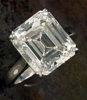 An emerald cut diamond solitaire ring ($80/95,000) in a platinum setting, 10½ carats, sold for $173,000.