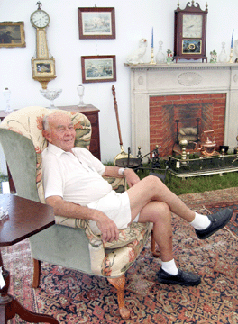 "Ours is a family business. I make a point of knowing everyone, where they live, where their kids go to camp. I always stop to say good morning. After an auction, I talk to customers, give them a pat on the back. We give a lot in service,†says Dick Withington, shown here comfortably seated.