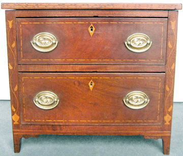 The highlight was an early Nineteenth Century miniature chest that sold for $134,400.