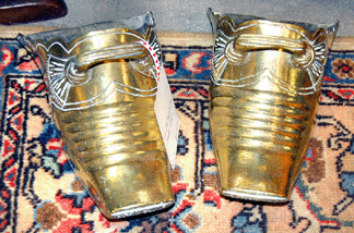 They resembled something used to remove ashes from a fireplace, but they were stirrups offered by Keith Funston.