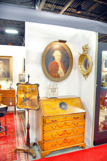 Peter Smith of Cape Cod's Sandwich Antiques pronounced himself a "show virgin.†For his first time out, the show was a great success. A 1777 portrait by John Durand and a pair of New England portraits stood over a 1790 Edinburgh sideboard.