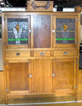 Karen and Albert Williams, Hempstead, N.Y., offered this Art Deco cupboard with leaded glass in the doors' windows.