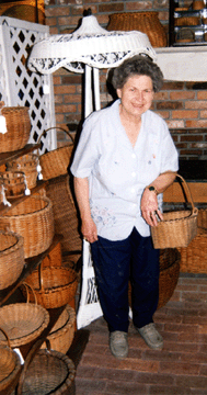 Nellie Ptaszek with her Taghkanic baskets. 