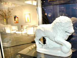 From the Mottahedeh collection, Luis Alegria Ida of Porto, Portugal, displayed this rare and unique Chinese porcelain lion made in the early Nineteenth Century and based on a Roman model.