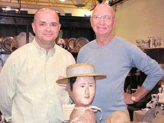 Exhibitor Hank Cochran, River Run Antiques, Point Pleasant, Penn., left, and Charles Frischmann, the president of the Delaware Township Historical Society.