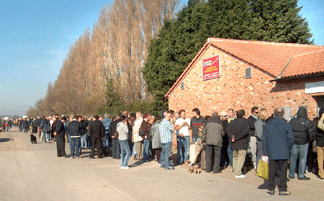 Waiting for the opening, each of three gates had lines extending hundreds of yards.