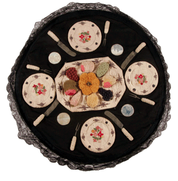 Table cover, artist unidentified, wool embroidery and cotton appliqué on wool, 31 inches diameter; circa 1870. Schwenkfelder Museum, Pennsburg, Penn.