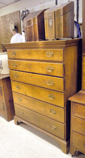The tall chest sold at $770.