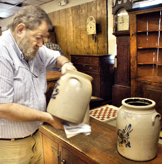 Looking over the stoneware.