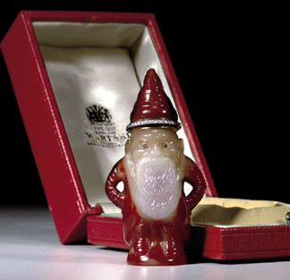 The Faberge rare carved carnelian figure of a gnome mounted as scent flask realized $1,384,000 †$1 million over its presale high estimate.