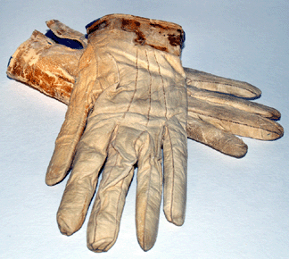 Leather gloves worn by Lincoln to Ford's Theater on the night of his assassination. Blood stains are visible at the cuffs. 