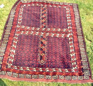 An antique Hatchli was offered by Soheil Oriental Rugs, New York City.