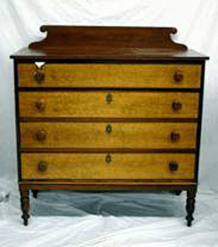 A Sheraton chest of drawers in maple and cherry was $1,736.