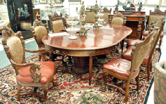 The suite of heavily carved mahogany furniture attributed to New York's Horner workshop dominated the action bringing a cumulative price of more than $37,000.