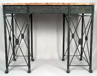Classical bronze console table and matching bronze mirror with classical scenes by Oscar Bruno Bach brought $29,700.