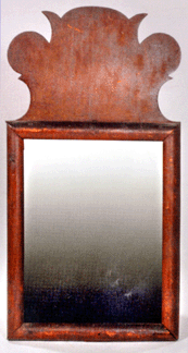 A choice Queen Anne mirror, undisturbed condition, high elaborate crest, 9½ by 19 inches overall, sold to Barbara Pollack of Highland, Park, Ill., for $35,200. It was of Connecticut origin, Mather family provenance, and was found in the Backofen home tucked away in a bureau drawer. Dealer Joe Martin said he owned the mirror many years ago and had paid $1,000 for it at the time.