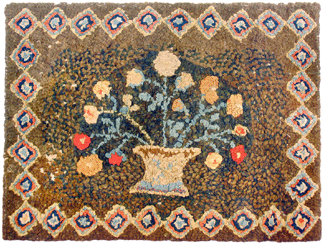 "We have lots of interest in this rug,†the auctioneer said as bidding began on lot 181, a wonderful early Nineteenth Century yarn-sewn rug, basket of flowers, measuring 35 by 47 inches. The final bid was $28,600.
