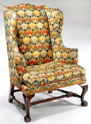 Unique among the many masterpieces in the collection is this eastern Massachusetts easy chair, 1750‱800, mahogany and secondary woods; 45½ by 32¾ by 31¾ inches, a prized survival among Eighteenth Century upholstered furniture. Only two others, at The Metropolitan Museum of Art and Winterthur Museum, have come down with their original needlework covers. 