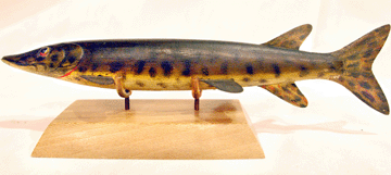 The musky spearing decoy by an unknown Lake Chautauqua maker, cataloged "as one of the finest New York fish made,†sold for a record price paid at auction at $34,500.