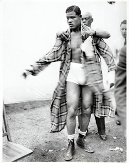 A hero to millions for his pugilistic prowess and his humility outside the ring, Joe Louis was portrayed with his trainer early in his career in this photograph by Underwood & Underwood, circa 1935. National Portrait Gallery, Smithsonian Institution.