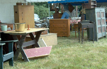 The Pirozzoli brothers were exhibiting side-by-side at the show, selling early furniture in great quantity. Rick and his wife, Candy, trade as Sport Hill Antiques in Redding, Conn., and Tom is from Sunapee, N.H.