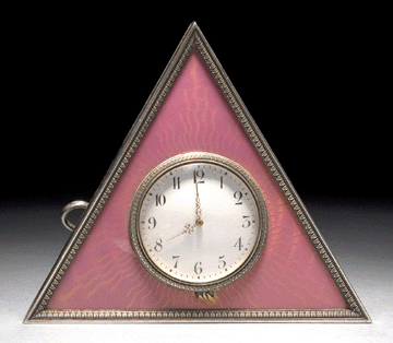 A Faberge triangle sunburst desk clock was the top lot of the auction when it attained $126,500.