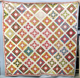 A mid-Nineteenth Century historic Montgomery County, Penn., "single rolling stone†signature quilt, signed in India ink in every block with family names, fetched $2,750.