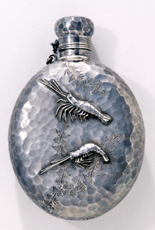 Sterling silver flask, circa 1880, with hammered surface and with applied shrimp decoration. Tiffany & Co., New York City.