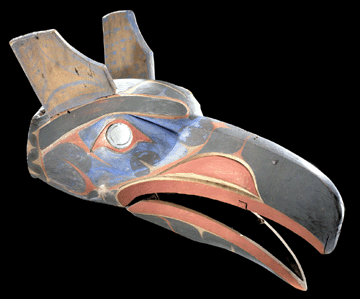 Nuxalk mask representing a raven, late Nineteenth Century,  British Columbia, Canada, carved alder, glass, vermilion, bluing, paint, cord and metal. ⁗alter Larrimore photo ©National Museum of the American Indian, Smithsonian Institution